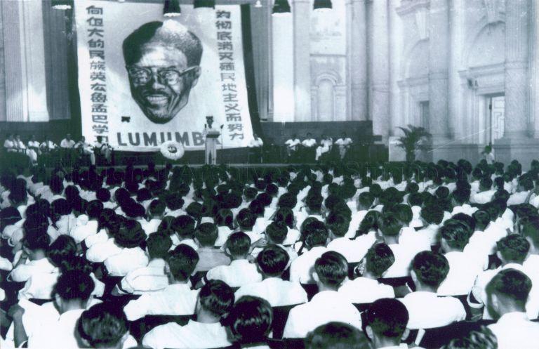 Photo shows a political rally held at the Victoria Memorial Hall. On the banner, the Chinese characters state the slogans "Learn from the Great Democratic Hero Lumumba" (left) and "Work hard towards completely wiping out Colonialism" (right) with the picture of Mr Patrice Lumumba in the middle. Mr Lumumba was a Congolese independence fighter, who later became the first legally elected Prime Minister of the Republic of Congo. Prior to the People's Action Party (PAP) winning the General Elections of 1959, it was a practice for the PAP and trade unions to look to inspirational political leaders such as Mr Lumumba, during the struggle against colonialism.
