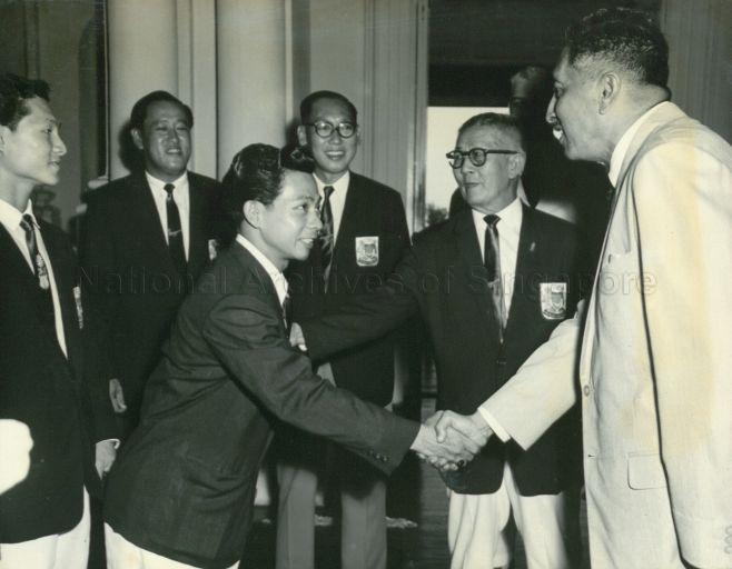 Yang Di-Pertuan Negara Yusof Ishak meeting one of the Singapore representatives to the first Southeast Asian Peninsular (SEAP) Games held in Bangkok from 12-17 December 1959
