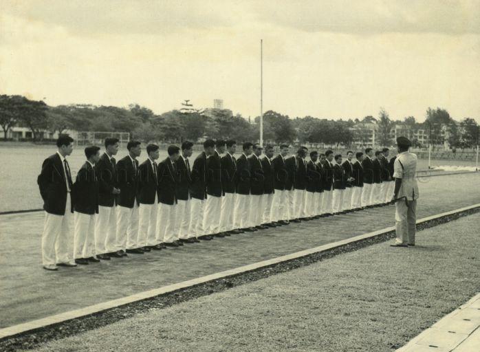 The Singapore contingent to the Southeast Asian Peninsular (SEAP) Games assembling for the "Lighting the Lamp" ceremony at Farrer Park Stadium