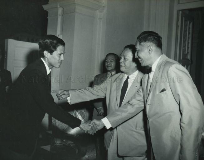 President of Singapore Amateur Football Association (SAFA), Soh Ghee Soon, introducing a team member to Yang Di-Pertuan Negara Yusof Ishak, at an Istana Negara tea reception for the team which defeated Perak in the Malaya Cup at Kuala Lumpur on 17 September 1960