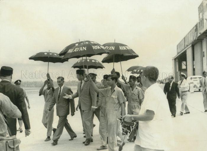 Yang Di-Pertuan Negara Yusof Ishak walking President of Pakistan Field Marshal Mohd Ayub Khan to the airplane for the latter's flight to Indonesia, at the Paya Lebar Airport