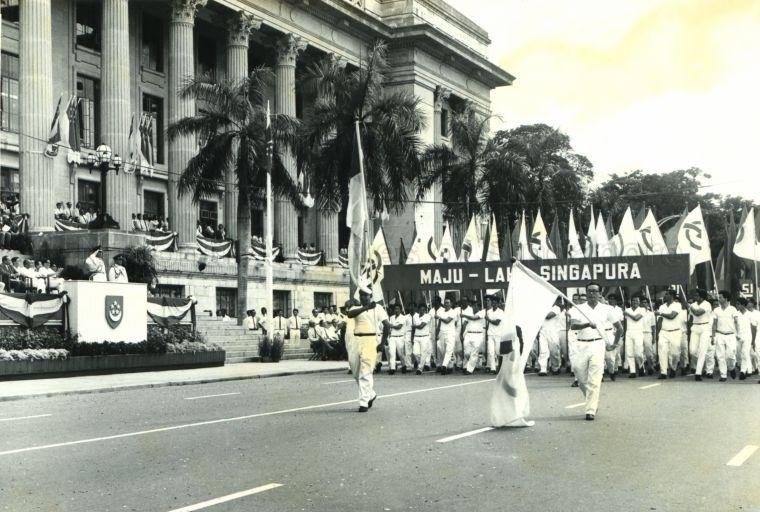 National Day Parade 1966 at the Padang - President Yusof Ishak taking the salute during marchpast by the People's Action Party contingent