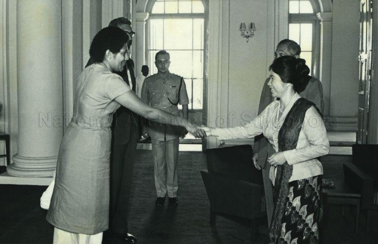 Mrs Ratu K T T Mara, wife of Chief Minister of Fiji, greeting Puan Noor Aishah at the Istana