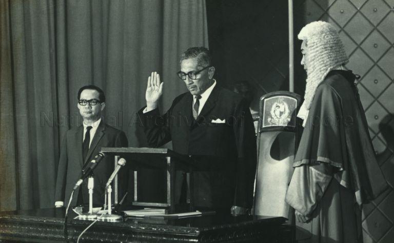 President Yusof Ishak taking oath of office as President of Singapore in the presence of Chief Justice Wee Chong Jin and Deputy Prime Minister Dr Toh Chin Chye