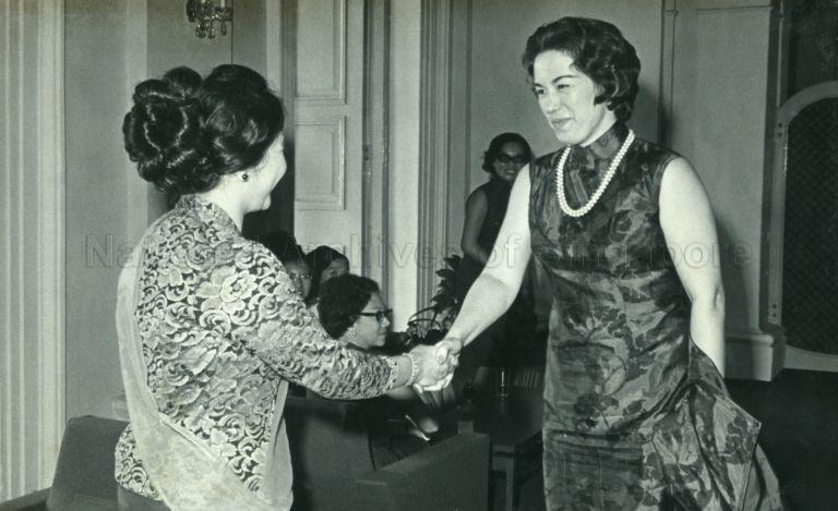 Puan Noor Aishah welcoming President of Singapore Girl Guides Association Mrs Cecilia Wee on her arrival for lunch at the Istana