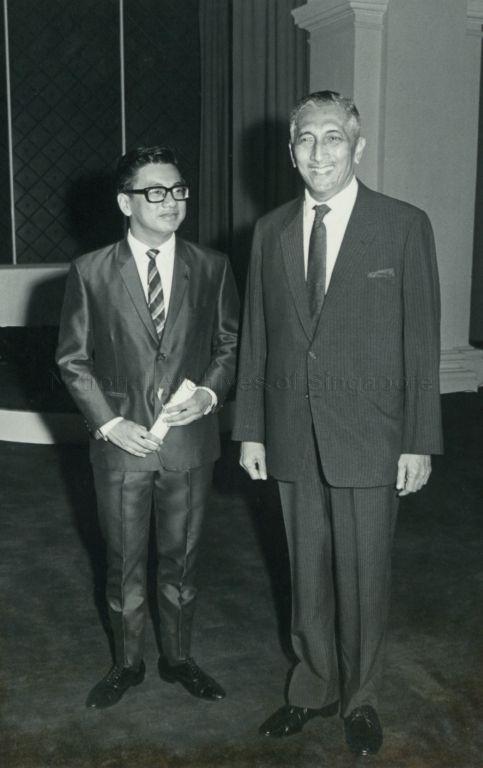 President Yusof Ishak posing with Jeffrey Chan Wah Teck, recipient of the President's scholarship, at the Istana