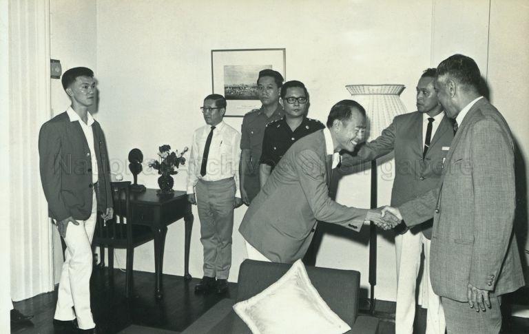 Singapore's Thomas Cup players calling on President Yusof Ishak at the Istana