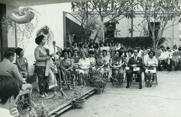 Puan Noor Aishah addressing officials and guests at opening of the new Young Women's Christian Association (YWCA) hostel at Fort Canning