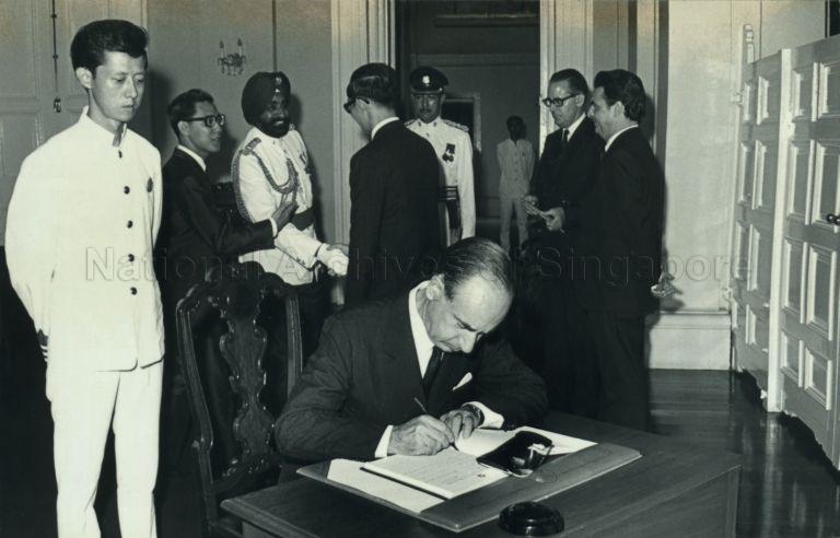 The new Italian Ambassador Dr Roberto De Cardona signing roll of Ambassadors after presenting his credentials at the Istana