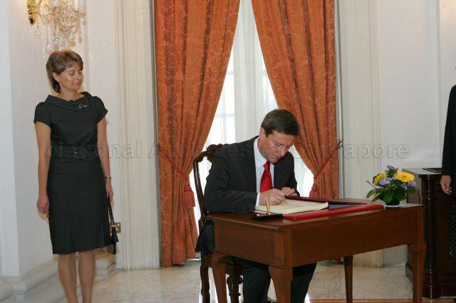 Ambassador-Designate of Republic of Poland Waldemar Dubaniowski signing guest &nbsp;book when he arrives at Istana to present credentials to President S R Nathan