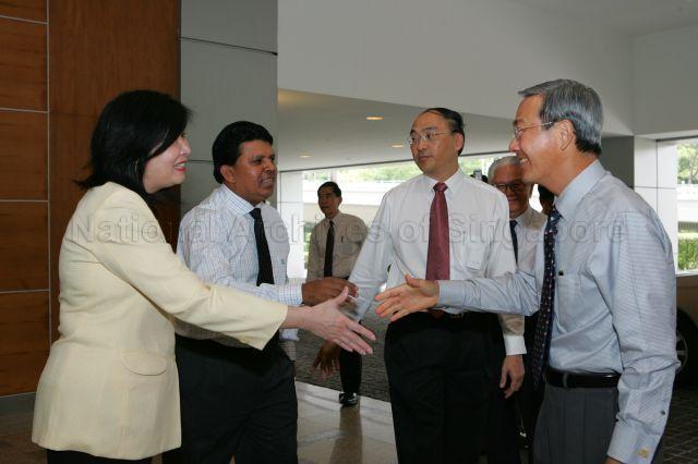 Singapore Press Holdings (SPH) Editor-in-chief Patrick Daniel (second from left) and SPH Executive Vice-President Ms Ginnie Lim May Ling (left) welcoming Minister for Information, Communications and the Arts Dr Lee Boon Yang during SPH 25th anniversary celebrations at SPH headquarters while SPH Chief Executive Officer Alan Chan Heng Loon (second from right) looks on