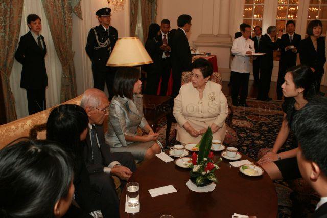 Wife of President, Mrs S R Nathan in conversation with wife of Minister for Manpower, Mrs Esther Gan during swearing-in ceremony of newly appointed cabinet ministers at Istana West Drawing Room