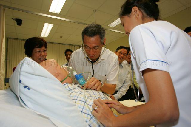 Taken at: Visit to Continuing Education Training Centre at Nanyang Polytechnic's School of Health Sciences Pictured: Prime Minister Lee Hsien Loong and Minister for Manpower Gan Kim Yong
