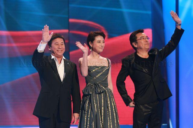 Hong Kong artistes from left, Ha Yu, Kathy Chow and David Chiang on stage during Star Awards at MediaCorp TV Theatre, Caldecott Hill