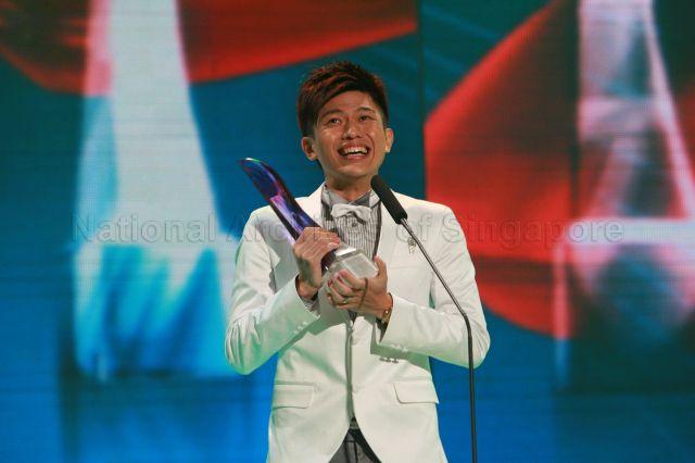 Winner of "Top 10 Most Popular Male Artistes" Pornsak delivering speech during Star Awards at MediaCorp TV Theatre, Caldecott Hill