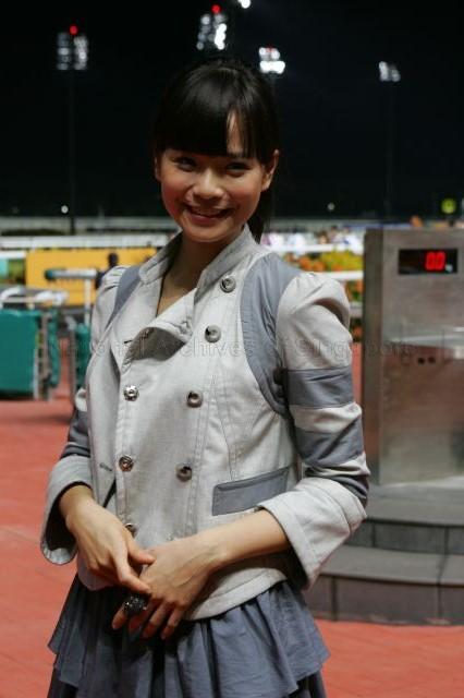 MediaCorp artiste Felicia Chin posing for photograph during KrisFlyer International Sprint and Singapore Airlines International Cup race events at Singapore Turf Club