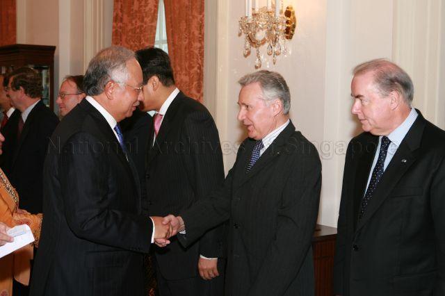 Prime Minister of Malaysia Datuk Seri Najib Tun Razak being introduced to officials and dignitaries when he arrives at the Istana while on a two-day state visit to Singapore
