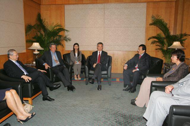 Prime Minister Lee Hsien Loong and Minister for Education and Second Minister for Defence Dr Ng Eng Hen with education ministers and senior officials from Australia, Canada, China, Hong Kong, Sweden and the United States at a round-table â€‹discussion during opening of Ninth World Convention of International Confederation of Principals (ICP) at Suntec City Convention Centre. On the left is Hong Kong Education Secretary Michael Suen.