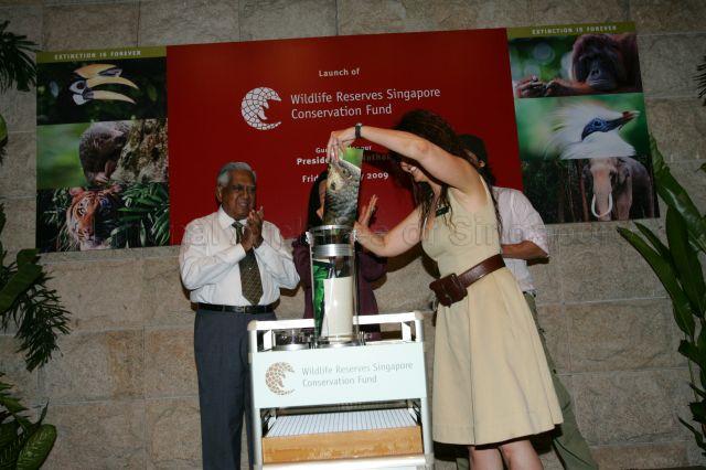 Group Chief Executive Officer of Wildlife Reserves Singapore Ms Fanny Lai filling a time capsule with wishes for Singapore's wildlife made by the public, which is scheduled to be opened on 50th anniversary of Singapore Zoo in 2023, during launch of Wildlife Reserves Singapore Conservation Fund, an independent conservation fund dedicated primarily to native wildlife conservation and education, at the zoo in Mandai. On the left is President S R Nathan.