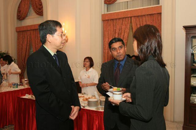 Principal Private Secretary to President S R Nathan, Tan Eng Beng, with Nominated Members of Parliament Viswa Sadasivan and Ms Joscelin Yeo Wei Ling at the reception during appointment ceremony at Istana