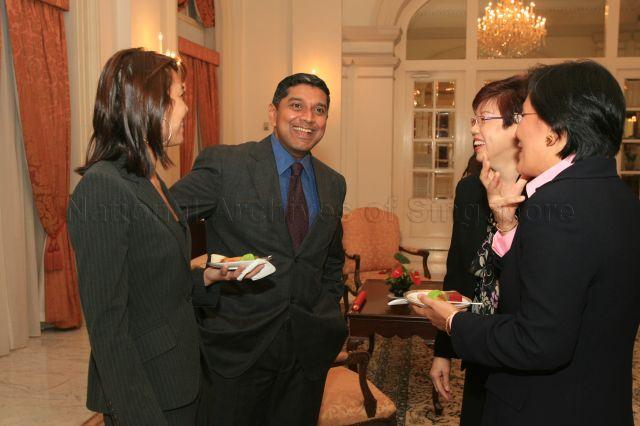 Nominated Members of Parliament Ms Joscelin Yeo Wei Ling (left), Viswa Sadasivan and Associate Professor Paulin Straughan (right) with official at the reception during appointment ceremony at Istana