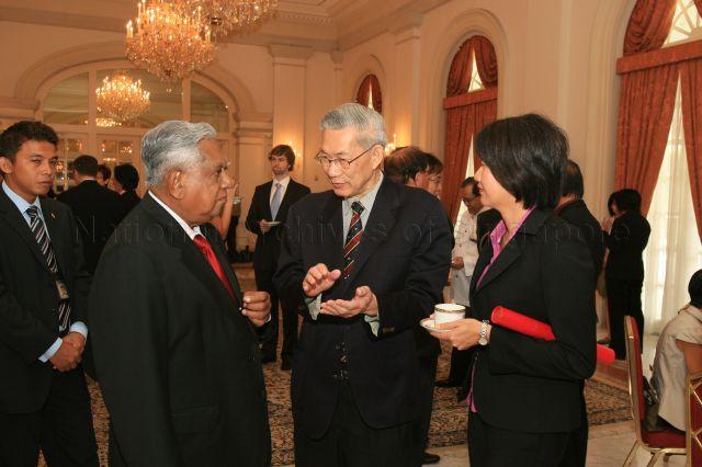 President S R Nathan with Nominated Member of Parliament Ms Audrey Wong Wai Yen and her family member at the reception during appointment ceremony at Istana