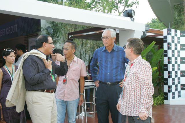 (From left) Senior Minister of State for Ministry of Trade and Industry S Iswaran, entrepreneur Ong Beng Seng and Senior Minister Goh Chok Tong at the Formula One (F1) Pit Building on the first day of F1 racing