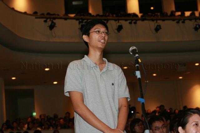 Student posing questions during Kent Ridge Ministerial Forum on the topic "What will the next 50 years have in store for Singapore?" at University Cultural Centre Hall, National University of Singapore (NUS), organised by NUS Students' Political Association