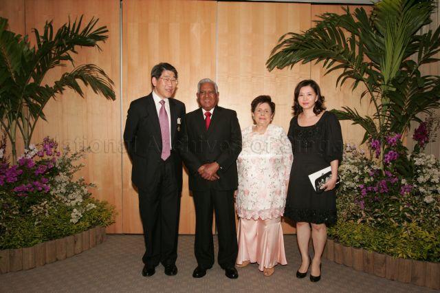 Group photograph of President and Mrs S R Nathan with recipient of Meritorious Service Medal Mr Philip Ng Chee Tat and his wife during investiture of 2009 National Day awards at University Cultural Centre, National University of Singapore in Kent Ridge