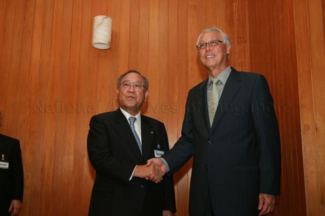 Chairman of Nippon Keidanren, the Japan Federation of Economic Organisation, Fujio Mitarai greeting Senior Minister Goh Chok Tong during a courtesy call at Istana