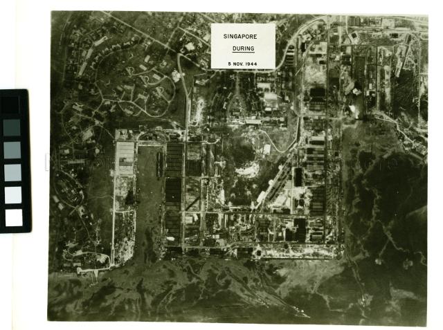Aerial photograph of the American bombing of Singapore during the Japanese Occupation, taken by the 40th Bomb Group Association during the bombing. North is to the bottom. Aerial photograph shows the Sembawang Naval Base area.