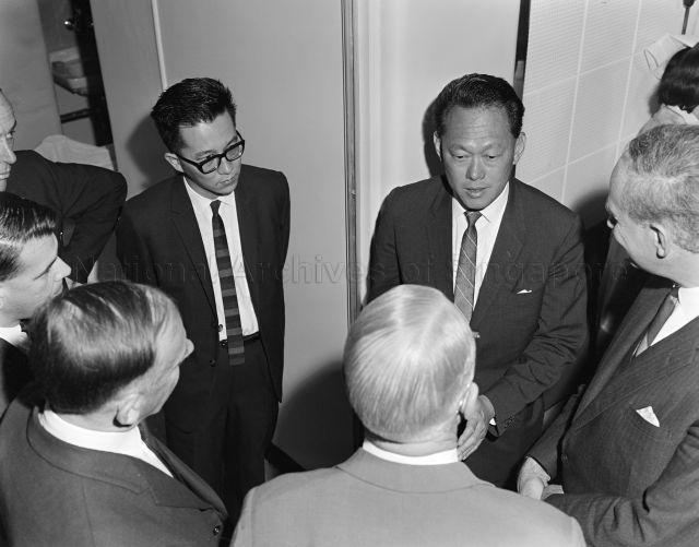 Prime Minister Lee Kuan Yew chats with Australian ear, nose and throat specialists during a visit to the Royal Victorian Eye and Ear Hospital, Melbourne. On PM Lee's right is Dr Goh Ewe Hong, Director of the ear, nose and throat clinic at the Singapore General Hospital who is studying in Australia