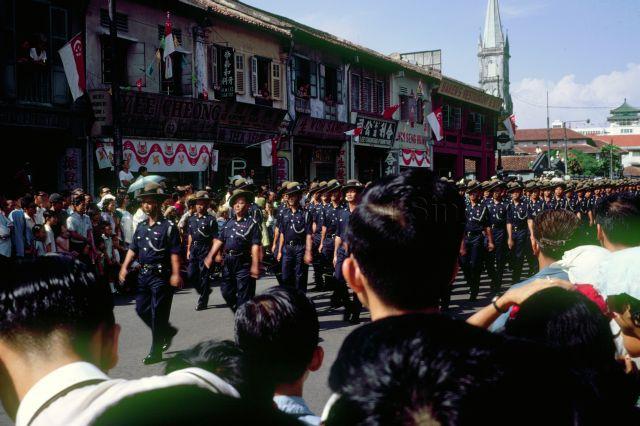 Gurkha Police contingent marching down Victoria Street during National Day Parade