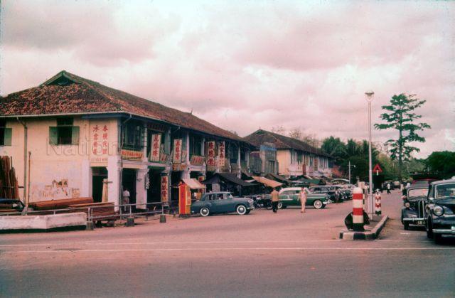 Junction of Jalan Jurong Kechil with Upper Bukit Timah Road. The Bukit Timah Market is between the two rows of shophouses.