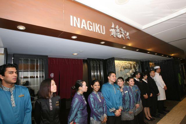 Staff of Swissotel The Stamford and Fairmont Singapore awaiting to meet Prime Minister Lee Hsien Loong and tripartite leaders, who are visiting staff performing essential duties on the first day of Chinese New Year