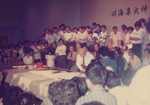 Artist Liu Hai Su demonstrating Chinese painting in Singapore