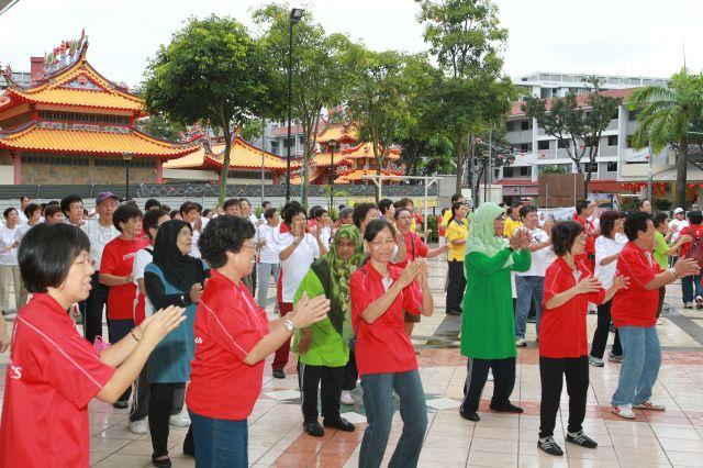 Residents doing mass workout at Yio Chu Kang Community Club, Ang Mo Kio Street 61, before the arrival of Prime Minister Lee Hsien Loong 