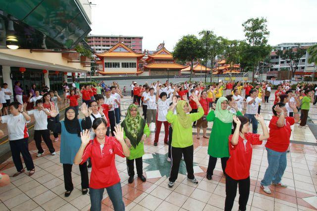 Residents doing mass workout at Yio Chu Kang Community Club, Ang Mo Kio Street 61, before the arrival of Prime Minister Lee Hsien Loong 