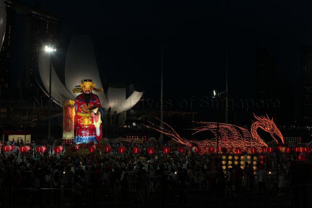 God of Wealth statue and Chinese New Year decorations at River Hongbao 2011 held at The Float@Marina Bay. Prime Minister Lee Hsien Loong visited River Hongbao carnival on the third day of Chinese New Year.