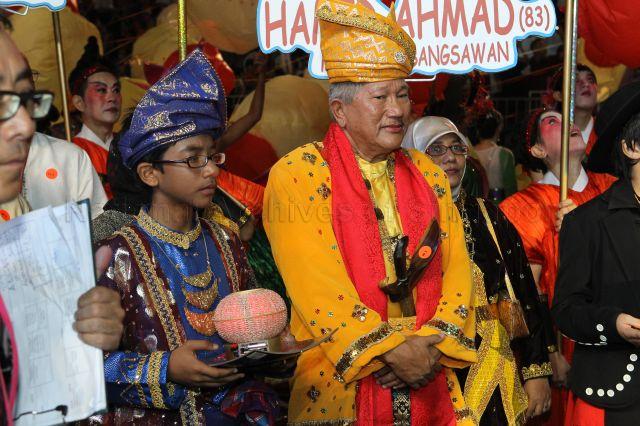 A senior member of the Malay opera troupe, Sri Anggerik Bangsawan, at a ceremony during opening night of Chingay parade 2011 at F1 Pit Building, Marina Bay. The event was attended by Prime Minister Lee Hsien Loong.