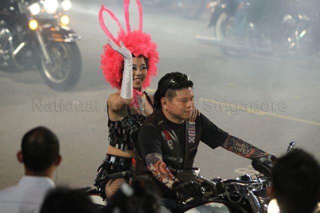 Entourage of Harley-Davidson motorcycles and vintage cars at second night of Chingay parade 2011 held at F1 Pit Building, Marina Bay. The event was attended by President S R Nathan and Senior Minister Goh Chok Tong.