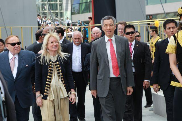 Taken at: Grand Opening of Marina Bay Sands at Marina Bay Sands Event Plaza outside ArtScience Museum Pictured: Prime Minister Lee Hsien Loong, Chairman of Marina Bay Sands Sheldon Adelson and his wife Madam Miriam Adelson