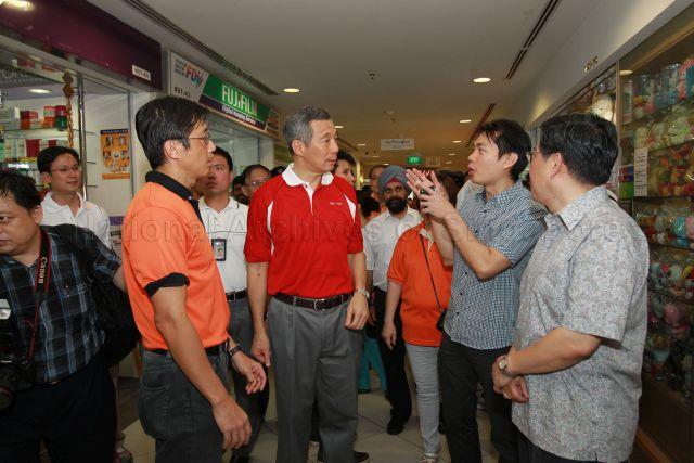 Prime Minister Lee Hsien Loong touring Hougang Point during visit to Aljunied-Hougang and Punggol South divisions, which come under Ang Mo Kio Group Representation Constituency (GRC) after changes to electoral boundaries