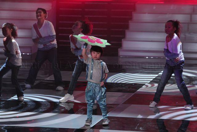 Taiwanese child star Xiao Xiao Bin performing at Society for the Physically Disabled (SPD)'s charity show held at Mediacorp television auditorium