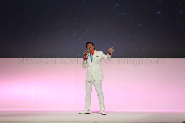 Singapore's music celebrity Dick Lee performing during Singapore Aviation Centennial Evening (ACE) dinner organised by Civil Aviation Authority of Singapore (CAAS) at Compass Ballroom East, Resorts World Sentosa