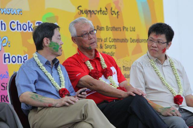 (From left) Member of Parliament (MP) for MacPherson Matthias Yao Chih, Senior Minister Goh Chok Tong and MP for Marine Parade Group Representation Constituency (GRC) Dr Ong Seh Hong with coloured powder on their faces at Holi Hungama, an Indian festival to mark the advent of spring, held at open field next to Kembangan Mass Rapid Transit (MRT) station