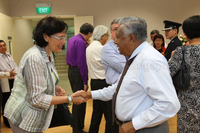 President S R Nathan and Dr Sheryn Mah, wife of Minister for National Development Mah Bow Tan, exchanging greetings during official opening of new premises of St Andrew's Autism Centre at No. 1 Elliot Road