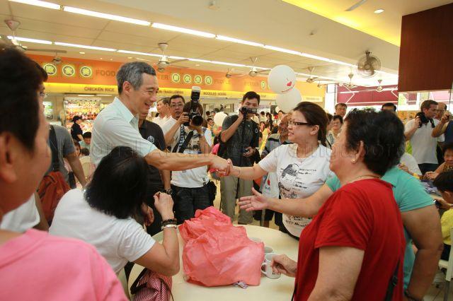 Prime Minister Lee Hsien Loong touring Koufu food court in Fernvale Point during Sengkang West Wellness Day