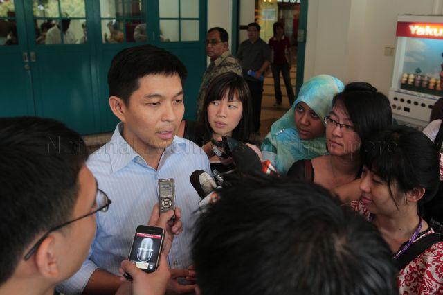 Former commander of Army Training and Doctrine Command Brigadier-General (NS) Tan Chuan Jin, who is a newcomer of People's Action Party (PAP), speaking to the media at Kampong Ubi Community Club during dialogue session with grassroots leaders from Kampong Ubi-Kembangan and Kaki Bukit divisions of Marine Parade Group Representation Constituency (GRC)