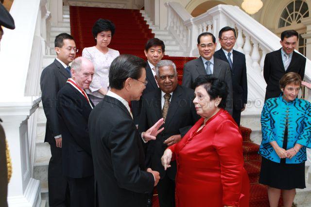 President and Mrs S R Nathan, Professor Edward Holmes and his wife with Ministers and Government officials during photograph taking session at Istana where the conferment of Honorary Citizen Award on Professor Holmes is held